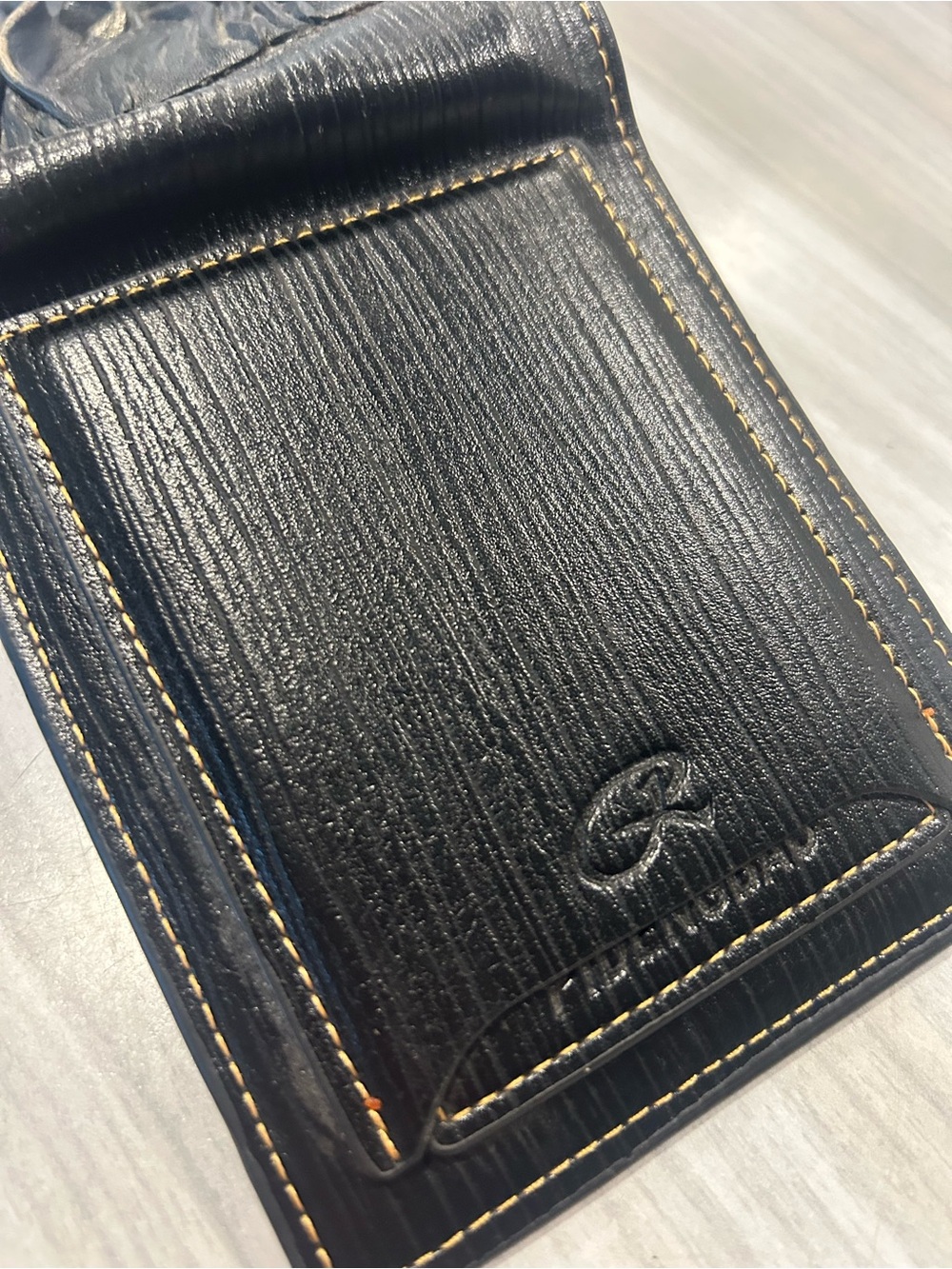 Men's Black Leather Bi-Fold Wallet with Embossed Face and Yellow Eye Accent - Picture 7 of 14